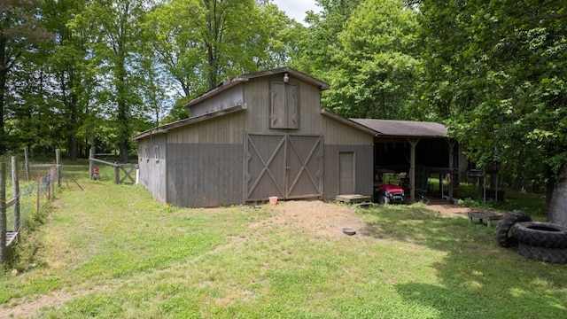 7621 Fernvale Rd, Fairview, TN 37062 - view of barn featuring a carport