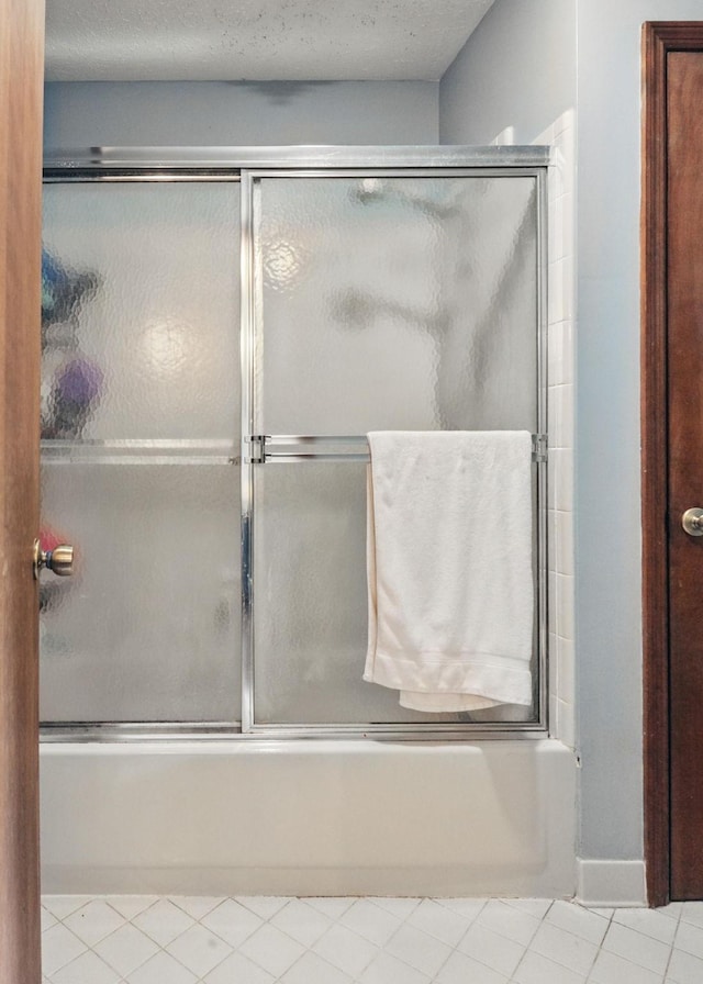 7621 Fernvale Rd, Fairview, TN 37062 - full bath with enclosed tub / shower combo, tile patterned flooring, and baseboards