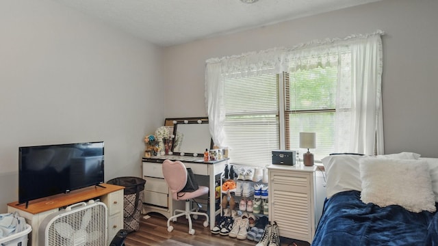 7621 Fernvale Rd, Fairview, TN 37062 - bedroom with dark wood-style flooring and a desk