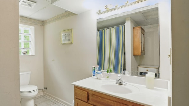 7621 Fernvale Rd, Fairview, TN 37062 - full bath with toilet, tile patterned floors, vanity, baseboards, and a shower with curtain