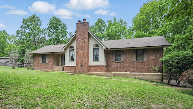 7621 Fernvale Rd, Fairview, TN 37062 - rear view of house with brick siding, a chimney, and roof with shingles