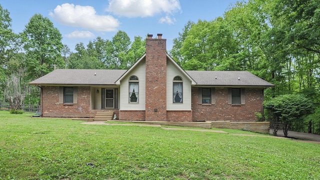 7621 Fernvale Rd, Fairview, TN 37062 - rear view of property with brick siding, a chimney, and roof with shingles