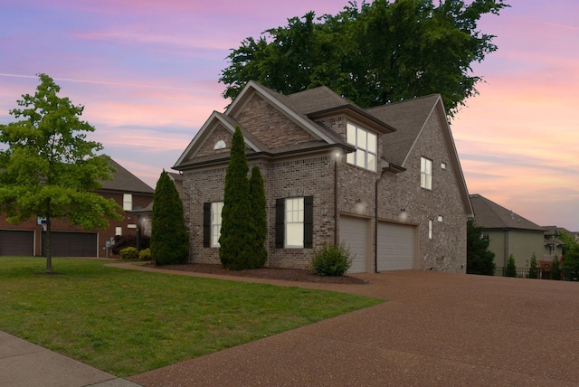 2078 Autumn Ridge Way, Spring Hill, TN 37174 - view of front of property with brick siding, concrete driveway, a lawn, and an attached garage