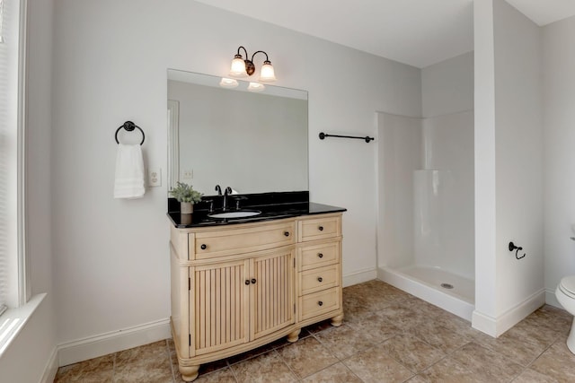 2078 Autumn Ridge Way, Spring Hill, TN 37174 - full bathroom featuring vanity, toilet, a shower, and baseboards