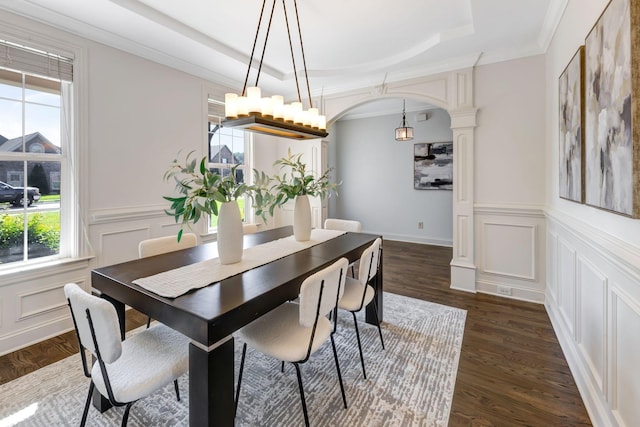2078 Autumn Ridge Way, Spring Hill, TN 37174 - dining room with a raised ceiling, arched walkways, a decorative wall, dark wood-type flooring, and a wainscoted wall