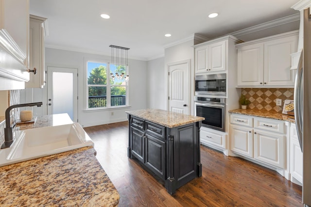 2078 Autumn Ridge Way, Spring Hill, TN 37174 - kitchen featuring appliances with stainless steel finishes, white cabinetry, a sink, dark wood-style floors, and dark cabinetry
