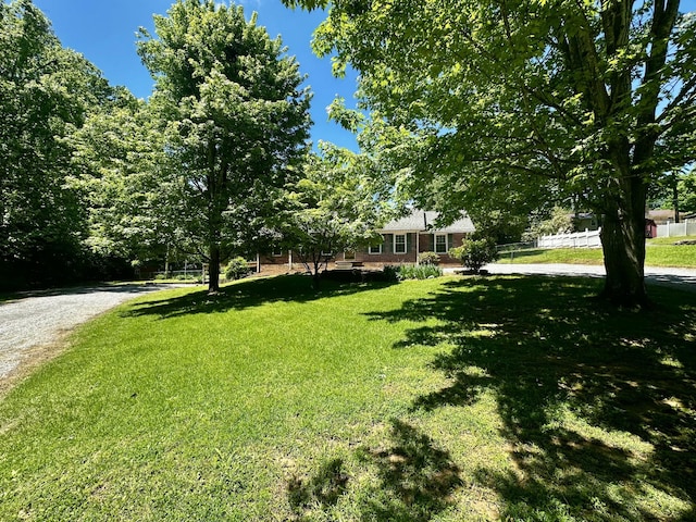 view of yard with fence