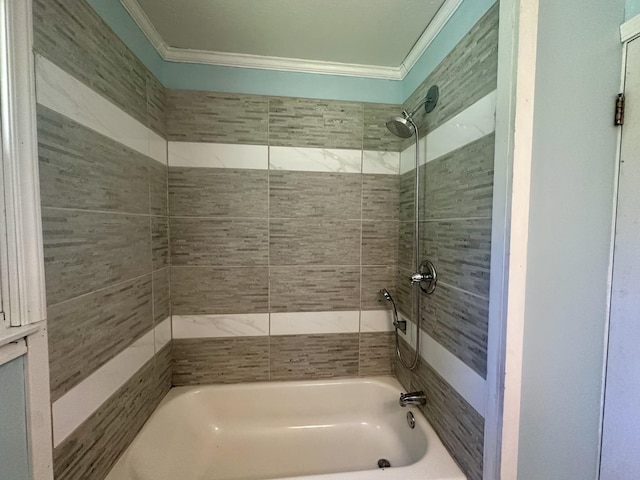bathroom featuring washtub / shower combination and crown molding