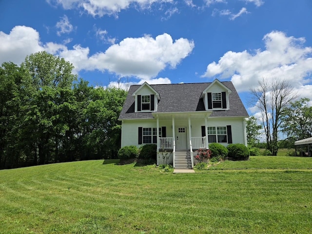 142 Hiwassee Rd, Lebanon, TN 37087 - cape cod home featuring a porch, a shingled roof, and a front lawn
