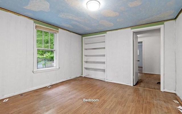 4101 Taft Hwy, Signal Mountain, TN 37377 - unfurnished bedroom featuring wood finished floors and baseboards