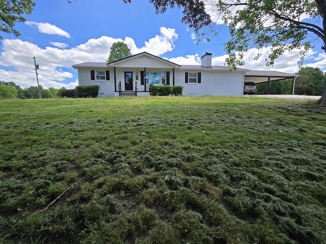 single story home with stucco siding, a chimney, a front yard, and an attached carport