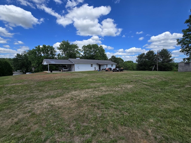 view of yard featuring a carport