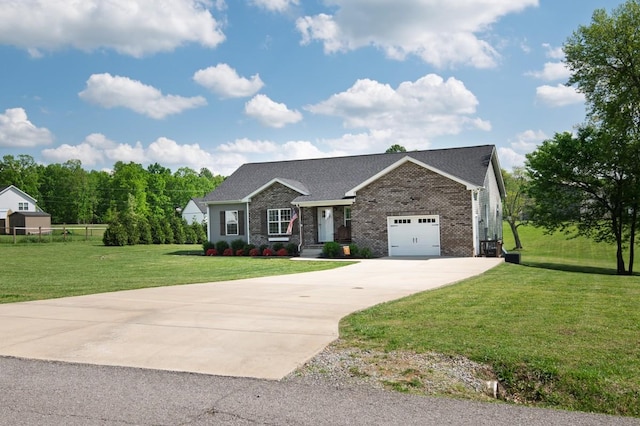 craftsman-style house featuring fence, brick siding, driveway, a garage, and a front lawn