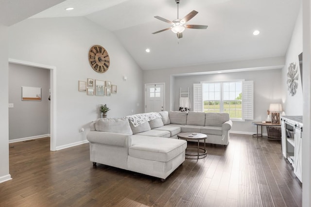 living area with a ceiling fan, recessed lighting, baseboards, dark wood finished floors, and high vaulted ceiling