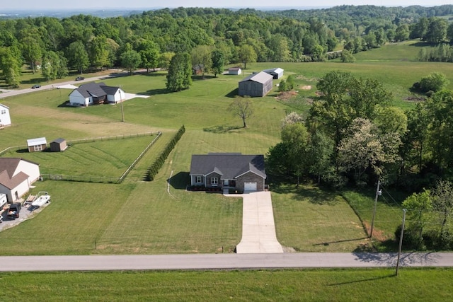bird's eye view with a rural view and a forest view