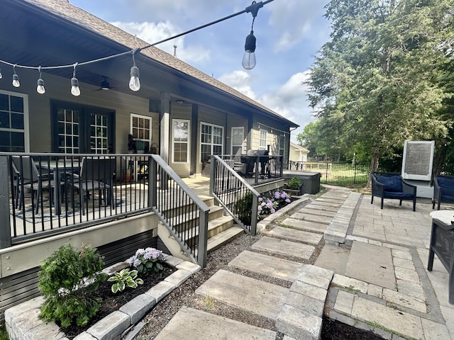 605 Nevins Pl, Nolensville, TN 37135 - doorway to property with fence, a shingled roof, french doors, and a patio area