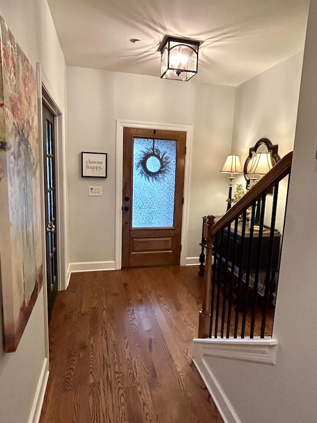 605 Nevins Pl, Nolensville, TN 37135 - foyer entrance with wood finished floors, baseboards, and stairs