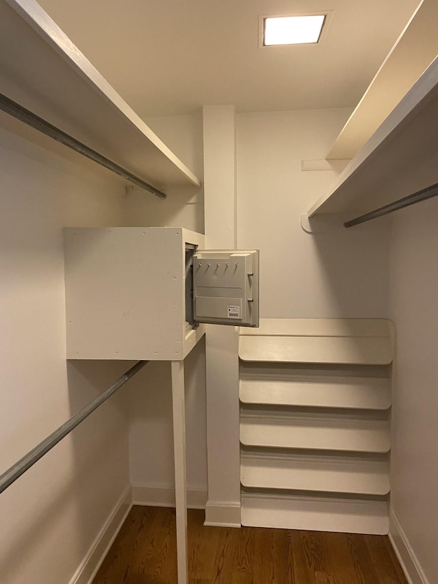 spacious closet featuring wood finished floors