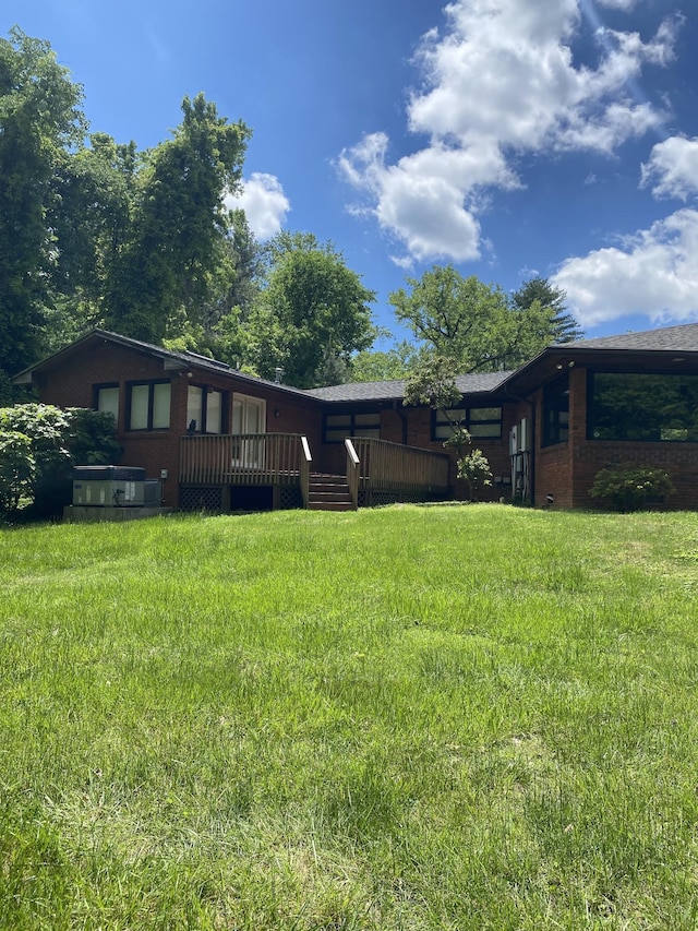 view of yard featuring a deck