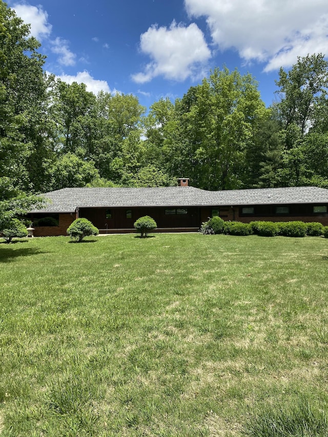 exterior space featuring a front lawn
