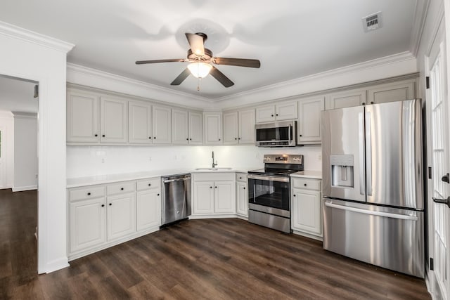 kitchen with ceiling fan, visible vents, a sink, light countertops, and appliances with stainless steel finishes