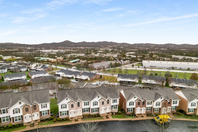 bird's eye view featuring a residential view and a mountain view