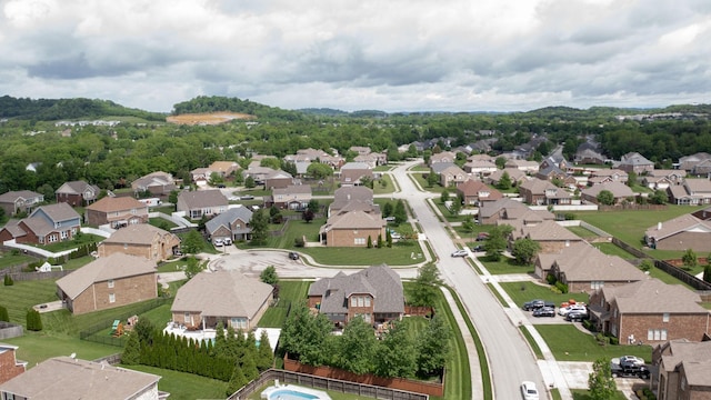 birds eye view of property with a residential view