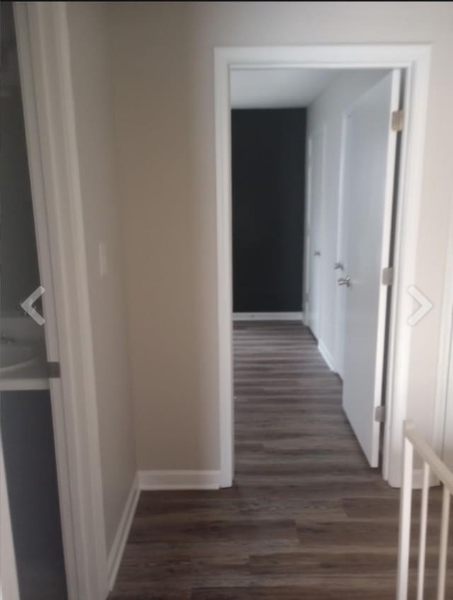 365 Peabody Dr, Clarksville, TN 37042 - hallway with baseboards and dark wood-style flooring