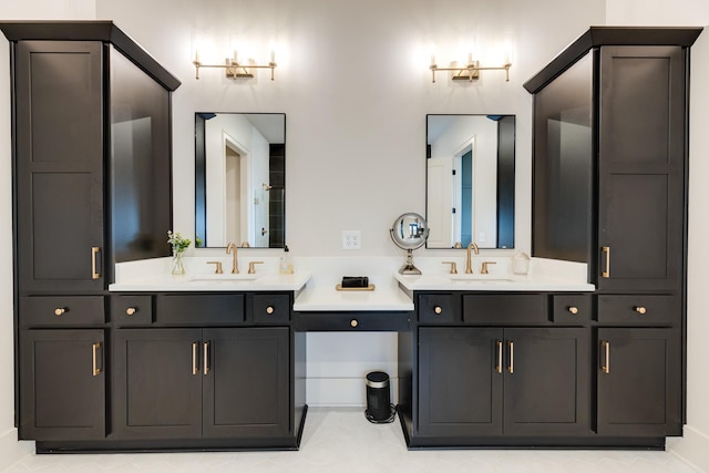 bathroom with walk in shower, double vanity, and a sink