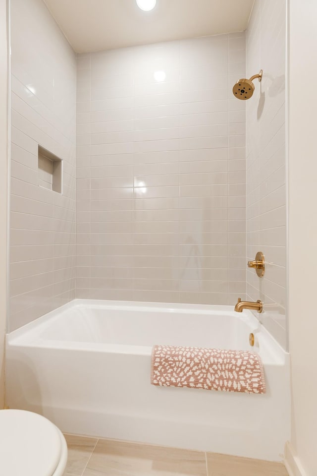 full bath with toilet and bathtub / shower combination