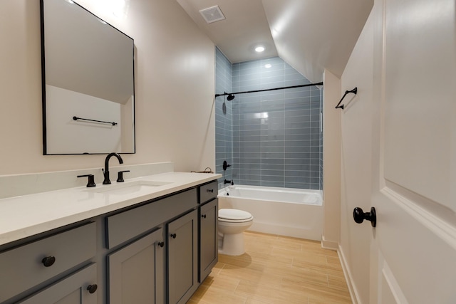 full bathroom with toilet, visible vents,  shower combination, and vanity