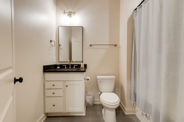 bathroom featuring toilet, tile patterned flooring, vanity, and a shower with shower curtain