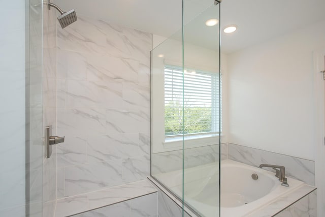 full bath with a garden tub, a shower, and recessed lighting