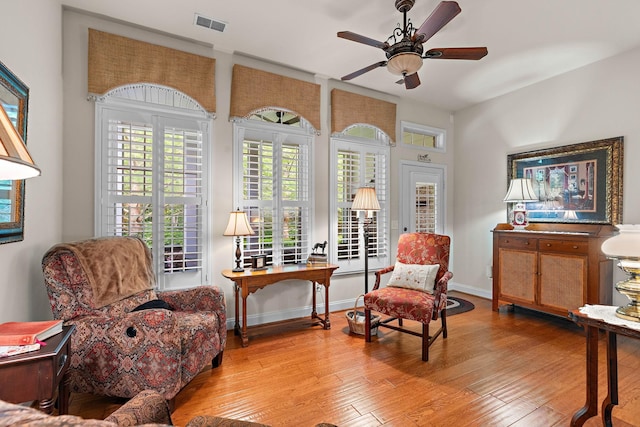 1230 Chickadee Cir, Hermitage, TN 37076 - living area with visible vents, baseboards, ceiling fan, and hardwood / wood-style flooring
