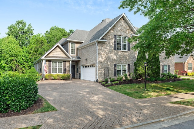 1230 Chickadee Cir, Hermitage, TN 37076 - traditional-style house featuring concrete driveway, brick siding, and a garage
