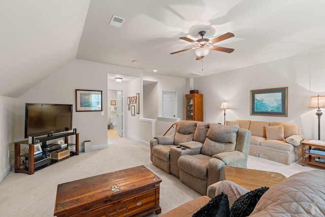 1230 Chickadee Cir, Hermitage, TN 37076 - living area featuring light colored carpet, visible vents, vaulted ceiling, a ceiling fan, and baseboards