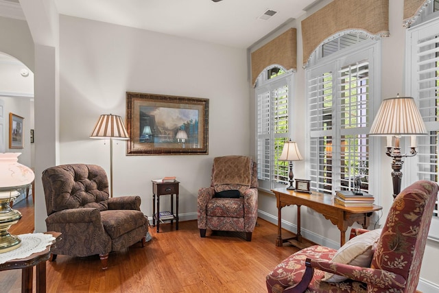 1230 Chickadee Cir, Hermitage, TN 37076 - living area with arched walkways and wood finished floors