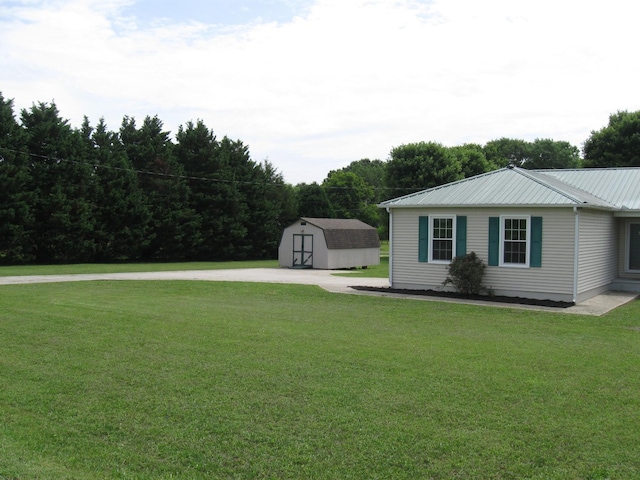 224 Gaines Cir, Estill Springs, TN 37330 - view of yard featuring an outbuilding and a storage shed