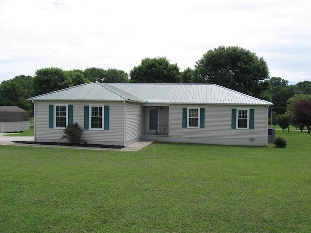 224 Gaines Cir, Estill Springs, TN 37330 - ranch-style home with a front yard, metal roof, and central AC