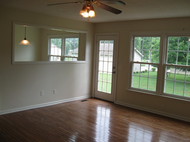 224 Gaines Cir, Estill Springs, TN 37330 - empty room featuring wood-type flooring, visible vents, baseboards, and ceiling fan