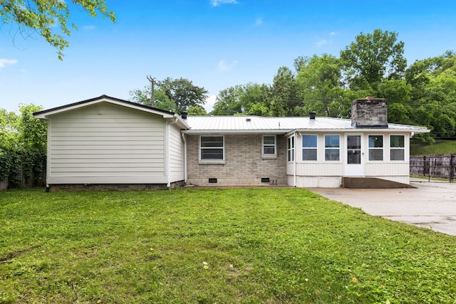 3103 Lakeland Dr, Nashville, TN 37214 - back of house featuring metal roof, a lawn, a chimney, and crawl space