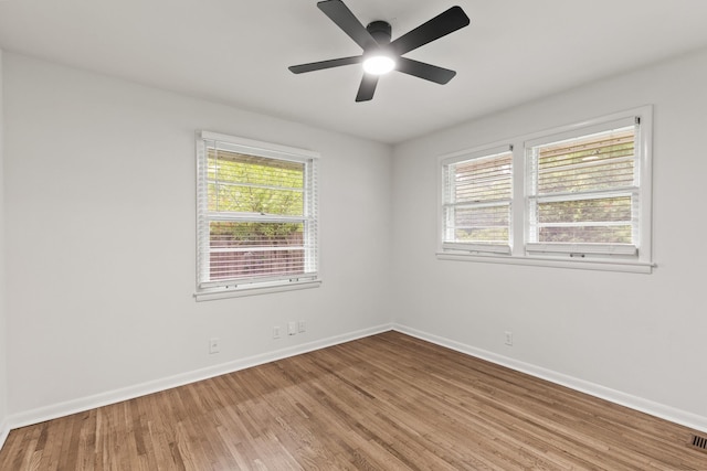 3103 Lakeland Dr, Nashville, TN 37214 - unfurnished room featuring baseboards, visible vents, ceiling fan, and wood finished floors