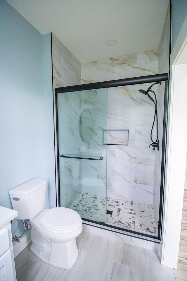 105 Shephard St N, Winchester, TN 37398 - bathroom with vanity, toilet, and a marble finish shower