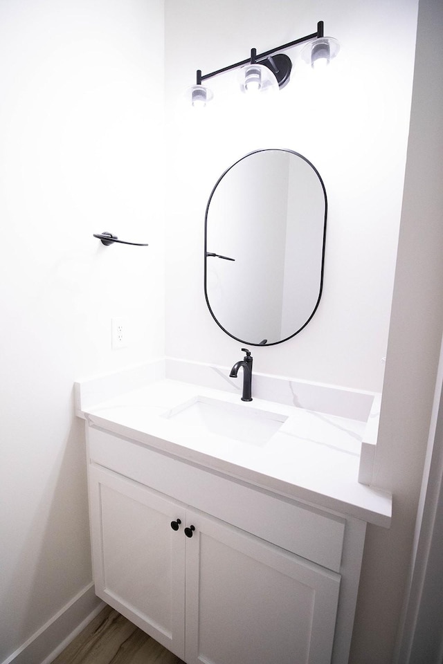 105 Shephard St N, Winchester, TN 37398 - bathroom with wood finished floors and vanity