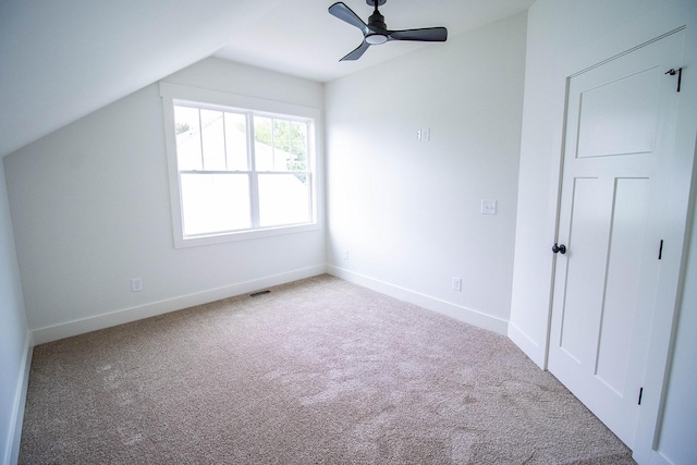 105 Shephard St N, Winchester, TN 37398 - unfurnished bedroom featuring vaulted ceiling, ceiling fan, carpet, and baseboards