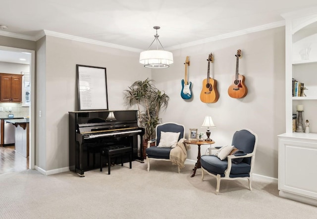 living area featuring baseboards, light carpet, and crown molding