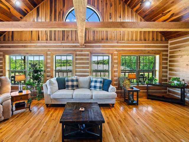 375 Good Hope Rd, Leoma, TN 38468 - living room featuring wooden walls, high vaulted ceiling, hardwood / wood-style floors, wood ceiling, and healthy amount of natural light
