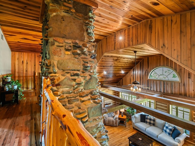 375 Good Hope Rd, Leoma, TN 38468 - living area with wood ceiling, wooden walls, lofted ceiling, and hardwood / wood-style floors