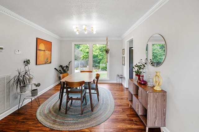 5024 Lakeridge Dr, Old Hickory, TN 37138 - dining room featuring a chandelier, crown molding, dark wood-type flooring, baseboards, and a textured ceiling