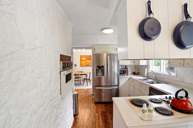 5024 Lakeridge Dr, Old Hickory, TN 37138 - kitchen with stainless steel fridge, a sink, dark wood-style floors, and light countertops
